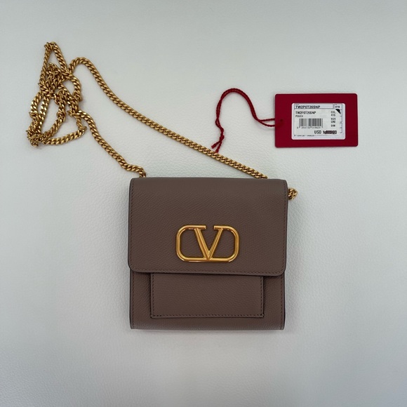 Valentino Garavani Handbags - NWT Valentino Vlogo Front Pocket Chain Leather Mini Cross Body Bag